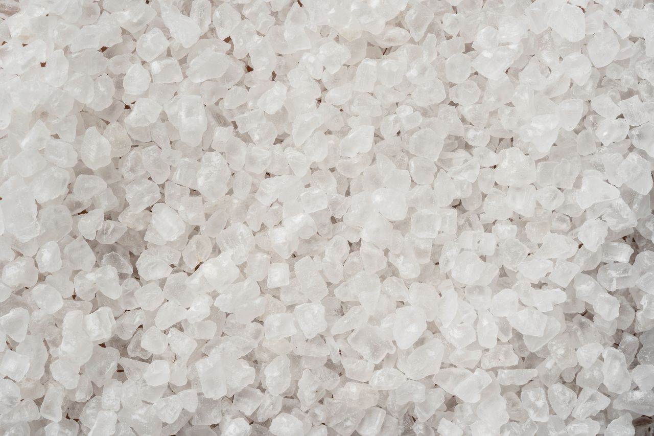 Crafting Captivating Headlines: Your awesome post title goes here Detailed image showing coarse white sea salt crystals with a textured surface.